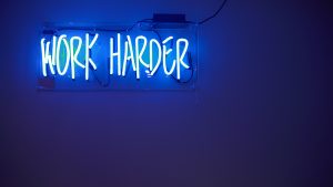 blue-Work-Harder-neon-signage by .