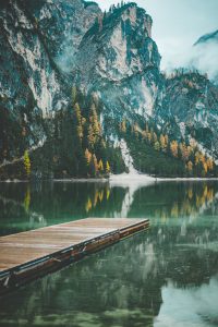 brown-wooden-dock-on-lake-near-mountain by .