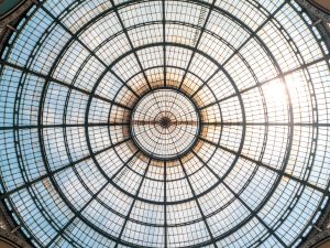 low-angle-view-of-round-white-metal-trusses by .